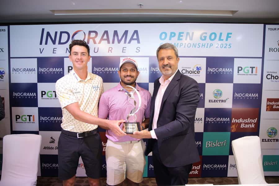 (L - R) Czech professional golfer Stepan Danek, leading Indian professional golfer Varun Parikh of Ahmedabad and Mr. Amandeep Johl, CEO, PGTI, pose with the trophy at the Press Conference of the Indorama Ventures Open Golf Championship 2025